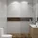 Детская ванная комната выполнена в плитке белого и зелёного цвета. Дизайн и ремонт дома в КП «Антоновка» — Загородный минимализм. Фото 057