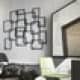 Диван серебристого цвета с салатовыми подушками. Дизайн и ремонт квартиры в ЖК «Ривер Парк» — Брутальный Нью-Йорк. Фото 09