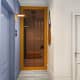 Дверь из светлого дерева для ванной комнаты. Дизайн и ремонт квартиры в ЖК «Триколор» — Шкатулка с секретом. Фото 01