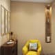 Диван светлого цвета с яркими подушками и жёлтым креслом. Дизайн и ремонт квартиры в ЖК «Новая олимпийская деревня» — Разноцветный калейдоскоп. Фото 04