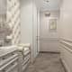 Простой, прямоугольный белоснежный шкаф для ванной комнаты. Дизайн и ремонт квартиры в ЖК «Вандер Парк» — Назад в будущее. Фото 02