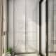 Белоснежный стеллаж с узкими, высокими полочками для современного интерьера. Дизайн и ремонт квартиры в ЖК «Редсайд» — Смелые идеи. Фото 016