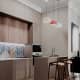 Оформление интерьера гостиной-кухни трехкомнатной квартиры в светло серый цвет в современном стиле. Фото № 67622.