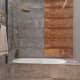 Стеклянные двери разделенные на прямоугольники, разделяющие гостиную от кухни. Дизайн и ремонт квартиры в ЖК «Дом в олимпийской деревне» — Лондонский дождь. Фото 018