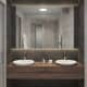 Ванная комната с ванной около панорамного зеркала. Дизайн и ремонт квартиры в ЖК «Крылатские холмы» — Гармония формы. Фото 0152
