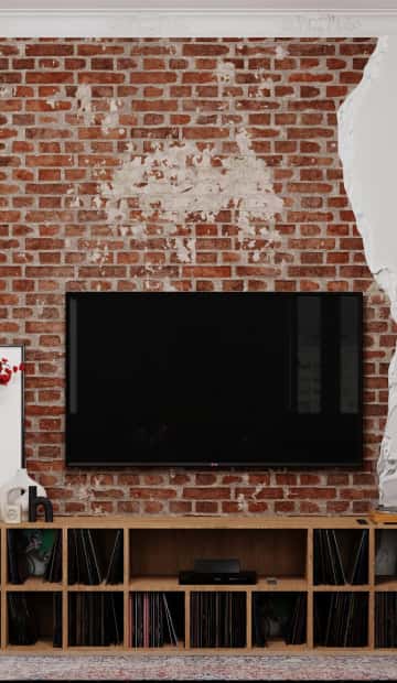 Под телевизор мы подобрали низкий стеллаж с множеством секций