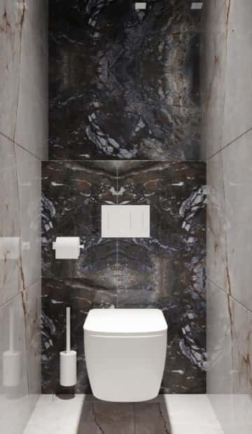 Кабинки выделили полированным серо-чёрным керамогранитом