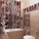 Плитка оттенков коричневого и красного для ванной комнаты. Дизайн и ремонт квартиры в ЖК «Лица» — Яркие моменты. Фото 015