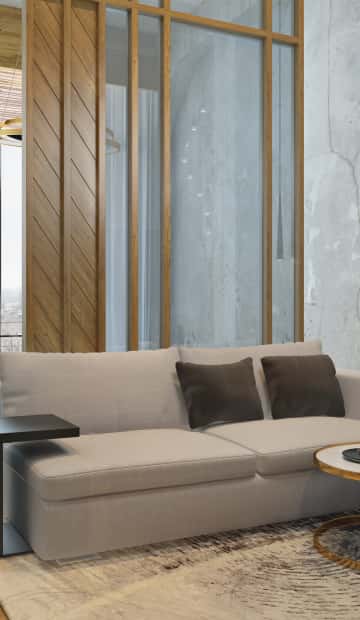 Диван кремового оттенка со встроенными столиками из тёмного дерева