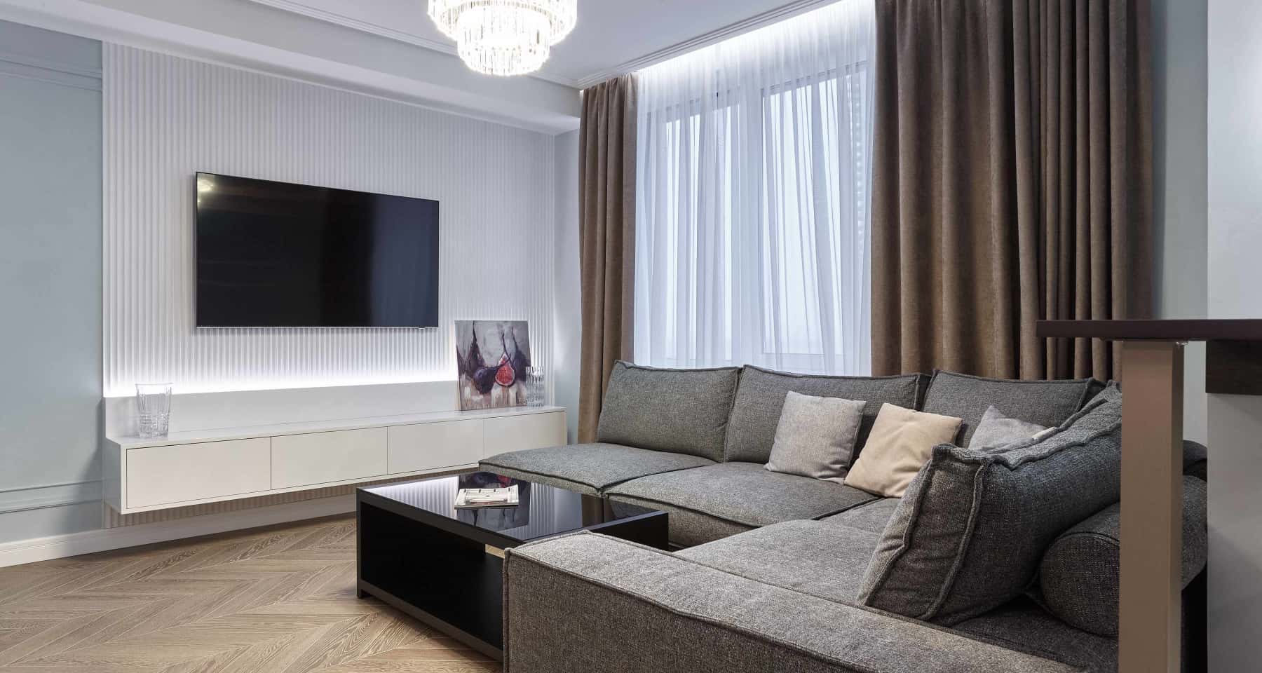 Дизайн гостиной с угловым диваном