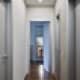 Небольшой коридор с серыми дверьми. Дизайн и ремонт квартиры в ЖК «Дубровская Слобода»  — Возвращение к простоте. Фото 026