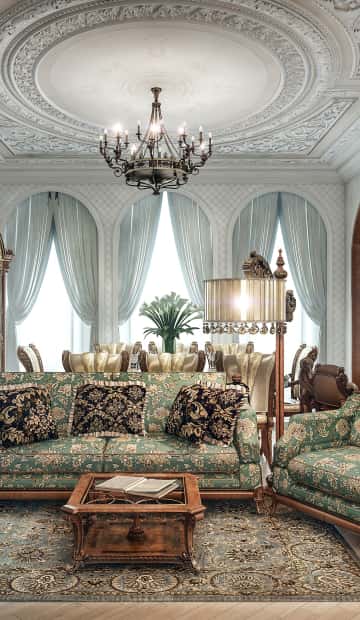 Диваны благородного изумрудного цвета с золотыми вышивками