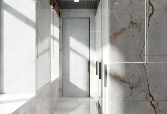 Фотографии нежилых помещений. Основные стены и кабинки обложили полированным керамогранитом.