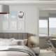 Широкая двухспальная кровать в белом цвете. Дизайн и ремонт квартиры в ЖК «Крылатские холмы» — Гармония формы. Фото 099