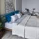 Ванная комната выполнена из мрамора с серыми прожилками. Дизайн и ремонт квартиры в ЖК «Альбатрос» — Литературный минимализм. Фото 019