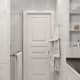 Шкаф со стеклянными дверцами белого цвета. Дизайн и ремонт квартиры в ЖК «Наследие» — Геометрия уюта. Фото 024