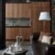 Кожаное кресло чёрного цвета для строгого интерьера. Дизайн и ремонт квартиры в ЖК «Barkli Park» — Витрувианская квартира. Фото 09