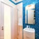 Шторка для ванной цвета шаронской розы акцентирует на себе часть внимание в этой комнате. Дизайн и ремонт квартиры в ЖК «DOMINION» — Квартира-ракушка. Фото 035