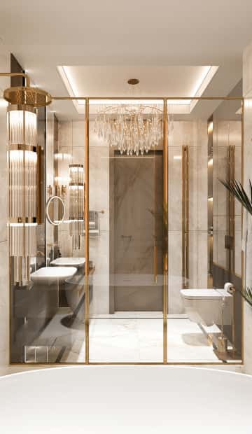 Все металлические элементы сантехники, осветительных приборов, перегородки и держатели подобрали из матового золота