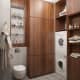Шкафы в ванной комнате сделаны из орехового дерева. Дизайн и ремонт квартиры в ЖК «Мосфильмовский» — Скандинавские мотивы. Фото 021