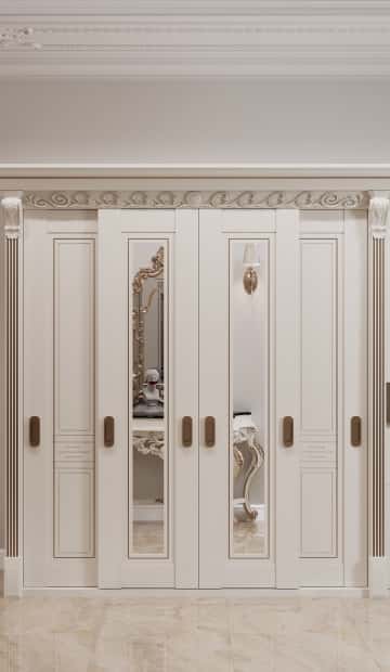 У входной двери организовали вешалку с мягкими панелями и крючками для повседневной одежды