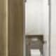 Пуфик из светлой кожи перед креслом. Дизайн и ремонт квартиры в ЖК «Петровский» — Новый горизонт. Фото 042